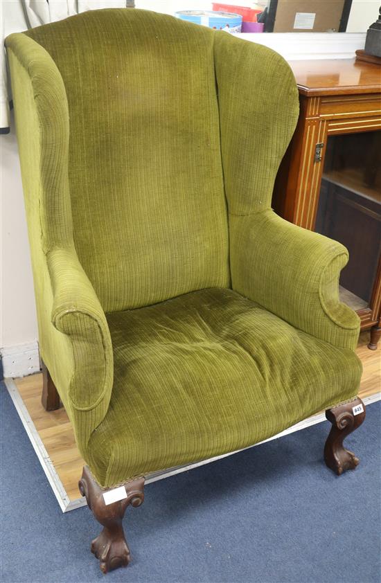 A Georgian style wing armchair